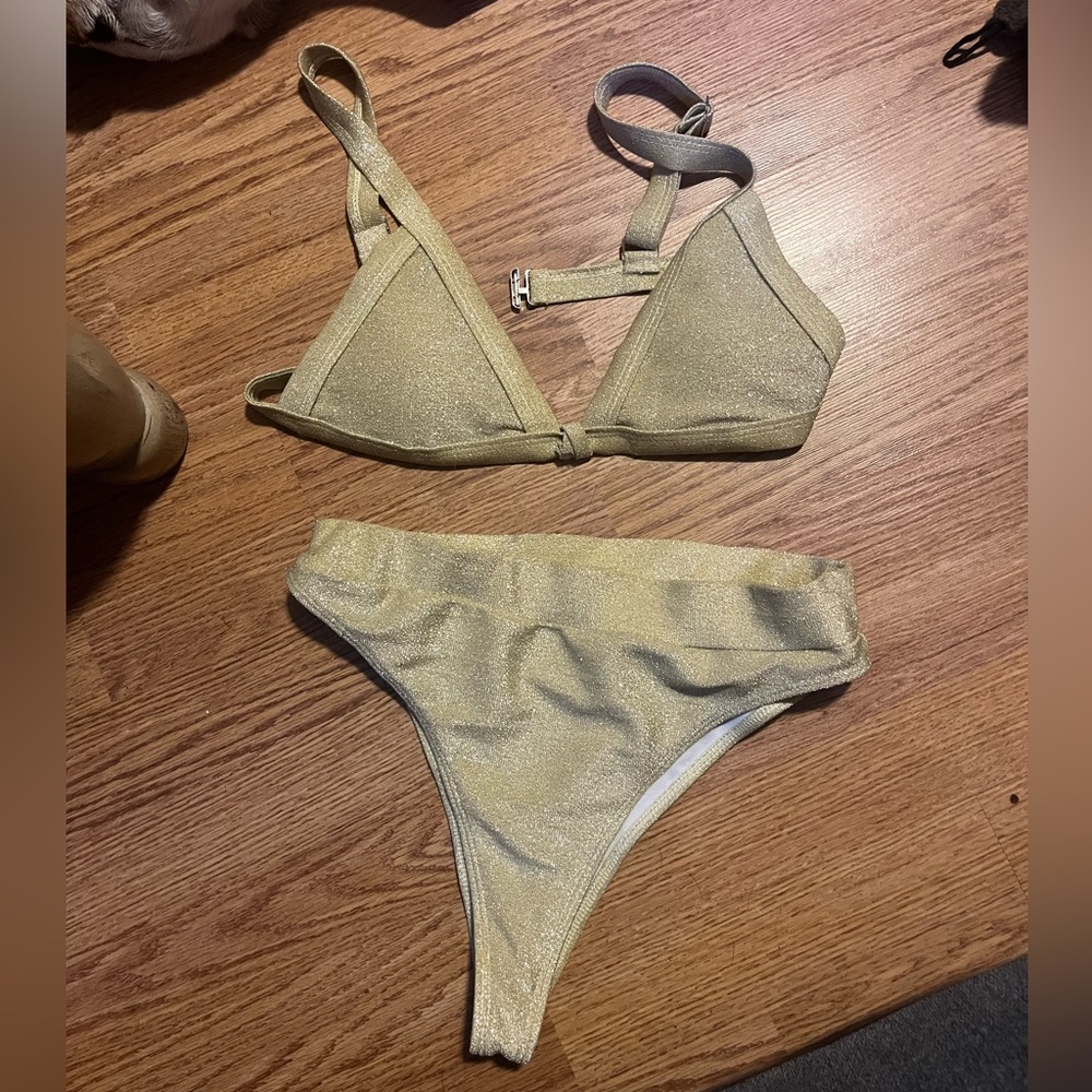Gold shimmering swimsuit high cut bottoms adjustable top